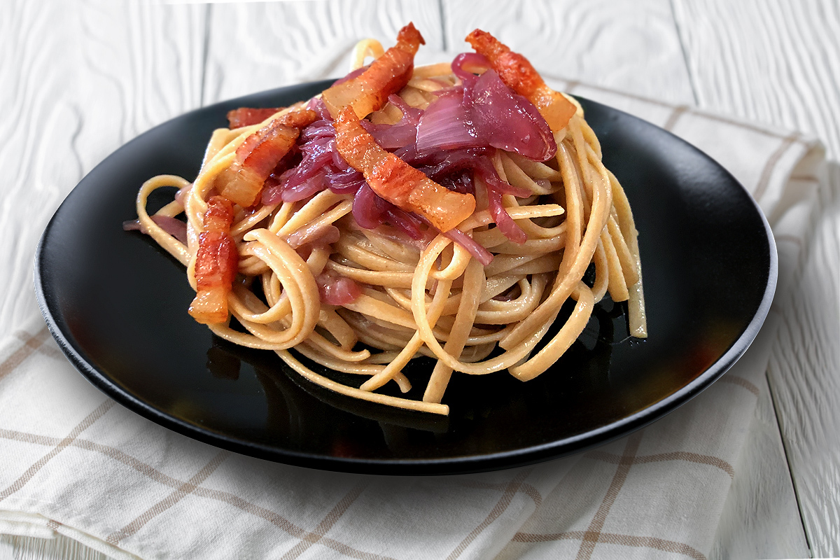 Stroncatura pasta with Tropea red onion and guanciale